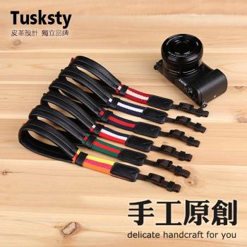 適用微單A7系列真皮相機牛皮腕帶富士萊卡尼康通用款手掛繩失手繩