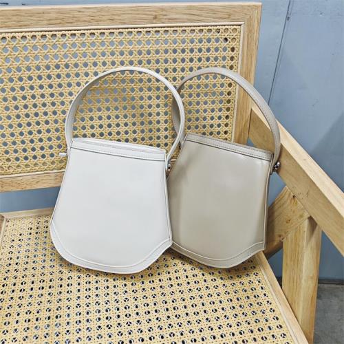 外貿倉庫牛皮女包2025新款真皮斜挎水桶包包女夏托特手機包小包包