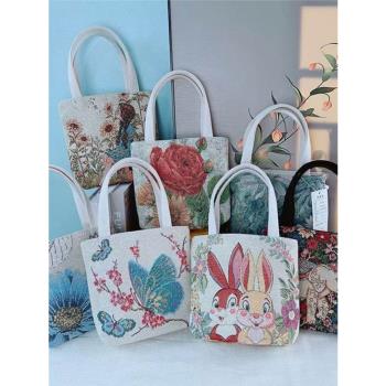 爆款精緻刺繡帆布手機包雙面圖案提花刺繡耐磨大容量手拎外出便攜