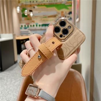 適用蘋果16promax手機殼新15手腕帶14簡約皮紋山茶花女款iphone13全包防摔矽膠套12/11網紅潮小眾plus高階感