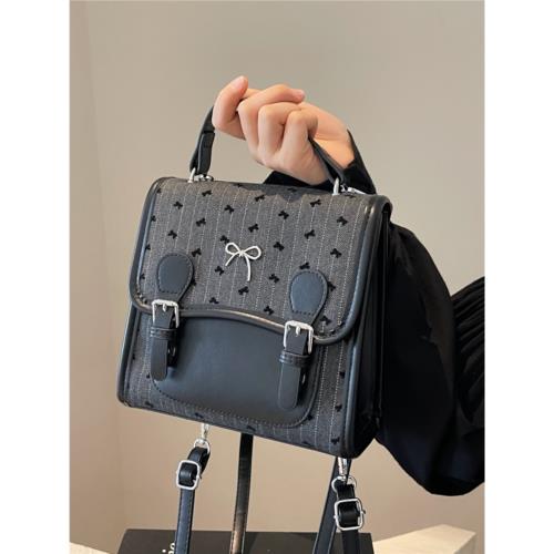 今年流行超火小眾波點女式雙肩包2024新款百搭后背包時尚迷你書包