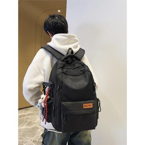 減壓書包男生初中生中學生簡約女高中生潮大容量新款防水雙肩背包