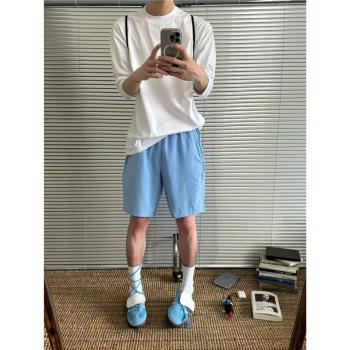 夏季新款奶藍色4分短褲男透氣多巴胺穿搭冰絲速幹褲子美式運動褲
