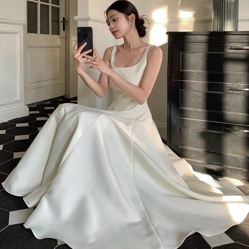 (免運)與繭 赫本裙設計感收腰顯瘦光澤感高級中長款吊帶連衣裙禮服裙