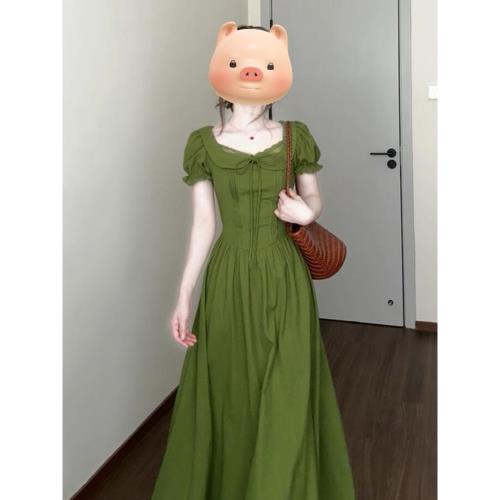 法式綠色泡泡袖連衣裙子女夏季2026新款大方得體獨特漂亮掐腰長裙