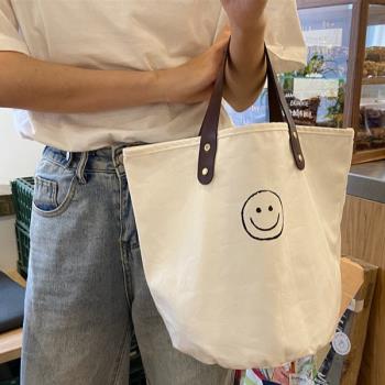 【Sayaka紗彌佳】日系休閒時尚笑臉造型皮質握把大容量手提包