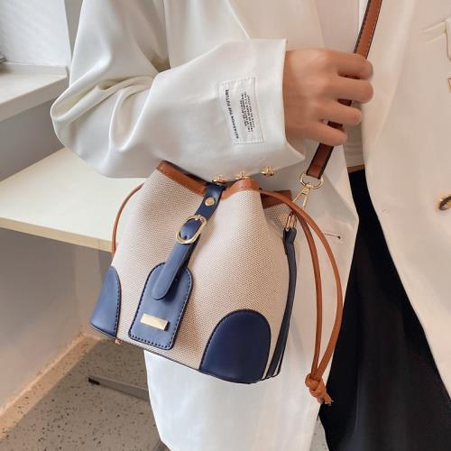 高級感帆布撞色斜挎水桶包包女春夏2025新款潮小眾設計百搭單肩包