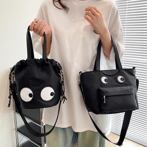 搞怪個性眼睛包包女2025新款輕便尼龍布托特便當包單肩斜跨購物袋