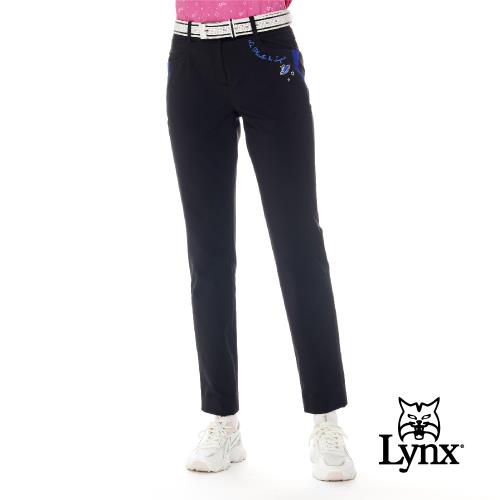 【Lynx Golf】女款日本進口布料彈性舒適LOGO鬆緊帶設計口袋配布剪接造型窄管長褲-黑色-慈濟