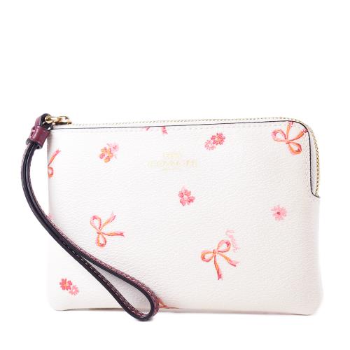 COACH 蝴蝶結防刮皮革手拿包-米白