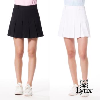 【Lynx Golf】女款彈性舒適百摺裙後腰LOGO織帶設計隱形拉鍊口袋山貓膠標運動短裙-白色
