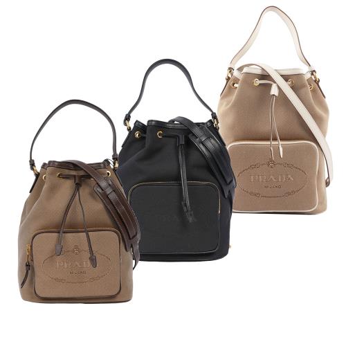 PRADA 刺繡Logo帆布拼皮革飾邊二用水桶包(大款)(任選) 1BH097 UCW