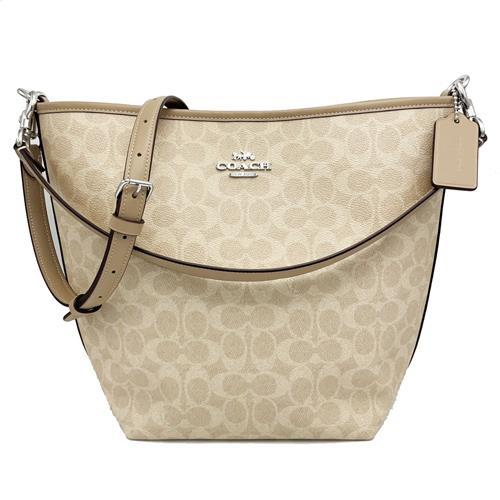 【COACH】新款C LOGO肩背斜背兩用水桶包(大款-奶咖)